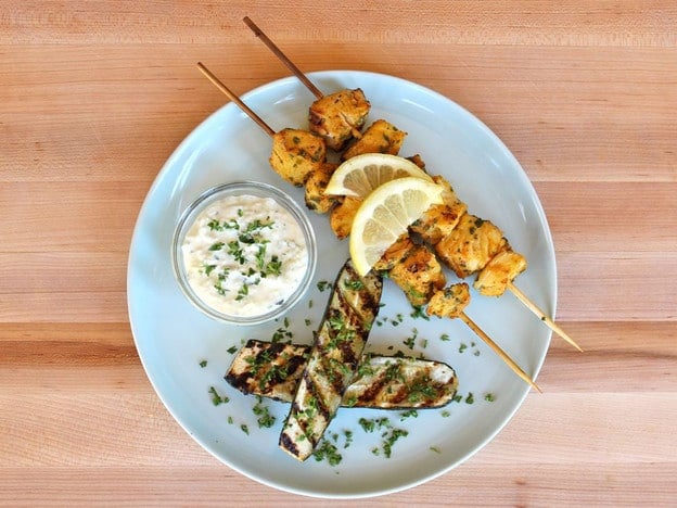 Marinated Fish Skewers - Grilled fish skewers marinated in Sephardic spices and herbs - cumin, paprika, turmeric, garlic, cayenne and cilantro with lemon juice. Kosher.