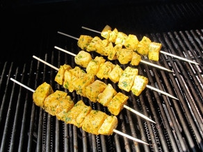 Fish skewers on the grill.