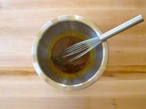 Whisk together olive oil marinade in small bowl.