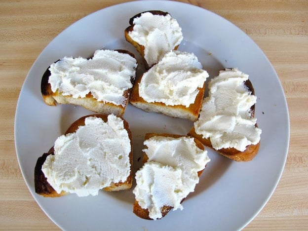 Ricotta spread on sliced, toasted challah.
