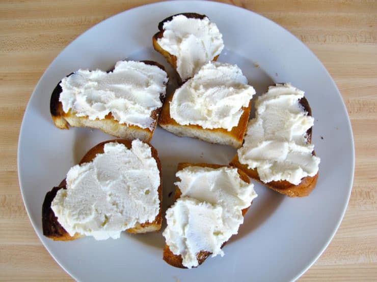 Ricotta spread on sliced, toasted challah.