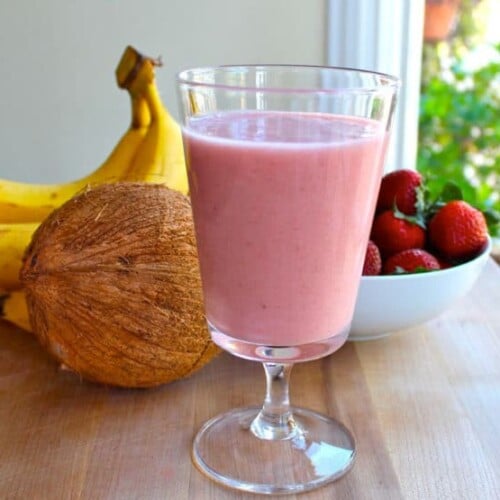 Rejuvenating Coconut Water Smoothie - This creamy coconut water smoothie will rejuvenate and rehydrate. Strawberries, bananas, coconut milk. Dairy free, gluten free