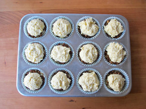Batter on top of streusel in lined muffin tin.