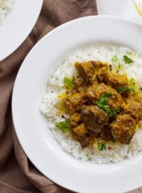 Persian Lamb Stew - Slow-cooked tender meat with turmeric, onions and red pepper flakes. Easy savory recipe.