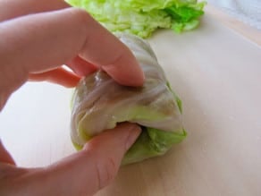 Tucking in the ends on cabbage roll.