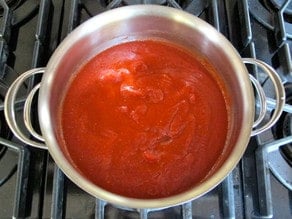 Pot of tomato sauce.