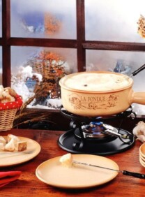 How to Make the Perfect Cheese Fondue - Ten tips for making a perfect cheese fondue. Includes cheese types, wines, non-alcoholic, gluten-free tips and more.