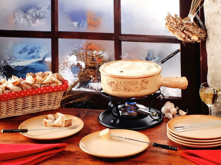 How to Make the Perfect Cheese Fondue - Ten tips for making a perfect cheese fondue. Includes cheese types, wines, non-alcoholic, gluten-free tips and more.