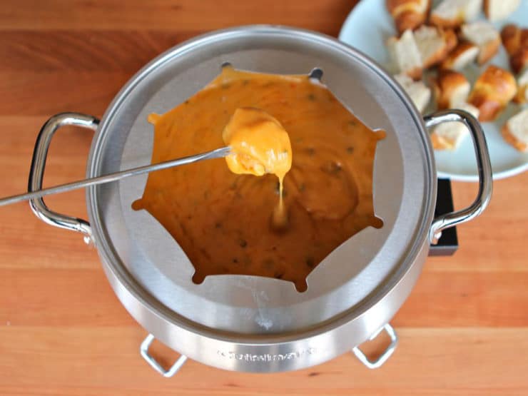 Cheesy Roasted Jalapeño Fondue - Learn how to make a perfect cheese fondue, then try my recipe for fondue with roasted jalapeños, cheddar, pepper jack and smoked paprika.