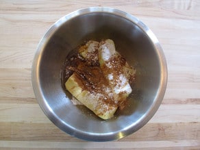 Butter, honey, and cinnamon in a mixing bowl.