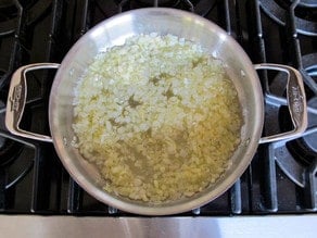 Diced onions in a skillet.