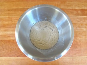 Yeast that has foamed in a bowl of water.