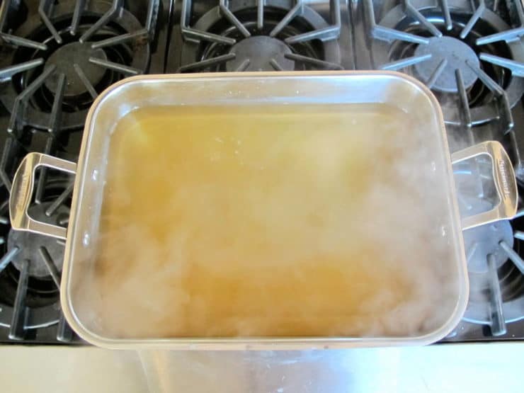 Roasting pan of hot water and baking soda.