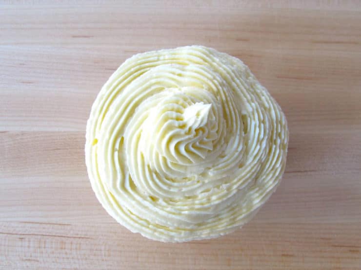 Coconut Buttercream Frosting - Make thick, rich, creamy coconut buttercream from scratch in just 5 minutes with step-by-step photos. Easy, Kosher, Dairy.