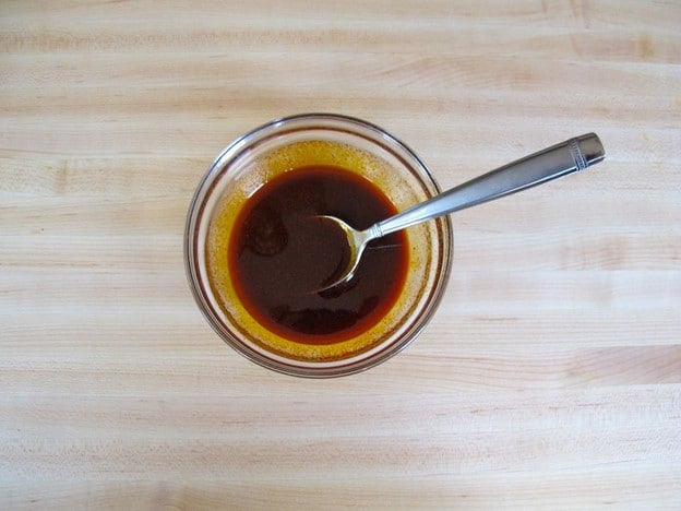 Use a fork to whisk paprika into oil.