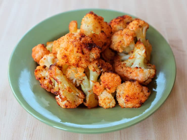 Smoky Roasted Cauliflower - How to roast cauliflower with smoked paprika, olive oil, and salt. Easy, tasty recipe. Healthy, gluten free, dairy free, vegan, kosher, pareve.