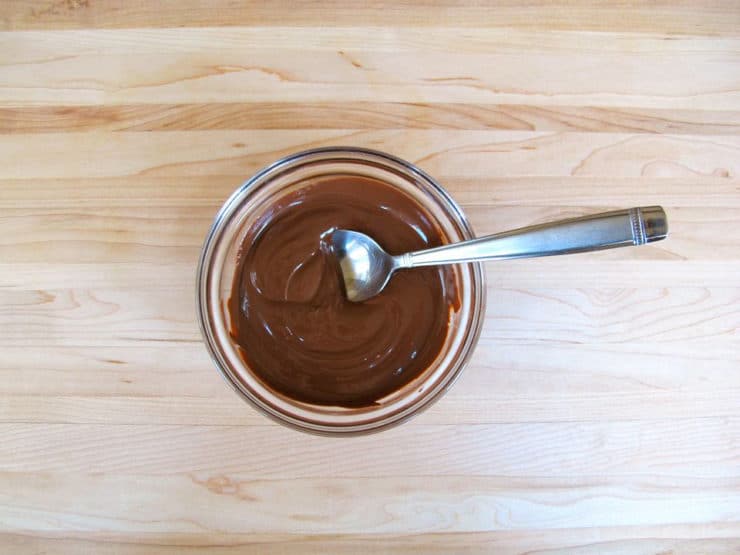 Melt chocolate in a small bowl using the microwave.