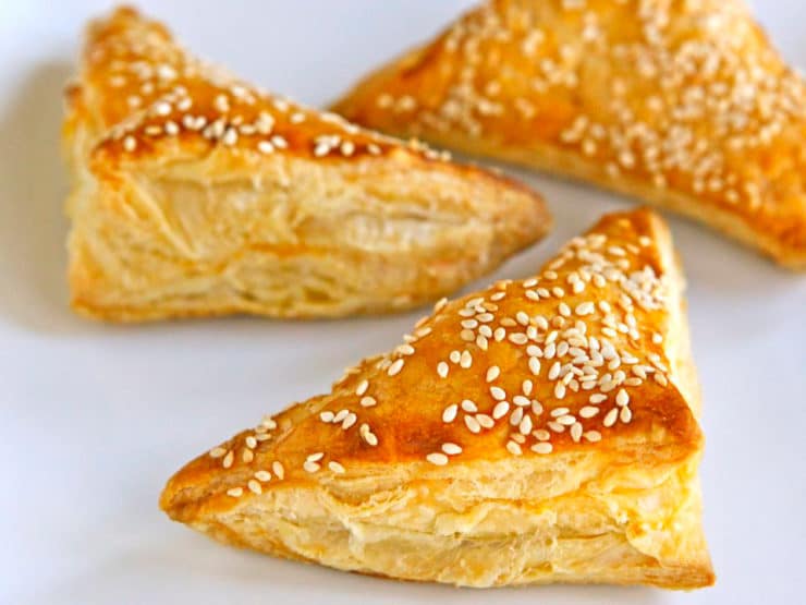 Cheese Bourekas - Recipe for savory Cheese Bourekas filled with creamy and salty feta cheese, kashkaval, & ricotta. Kosher, dairy.