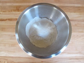 Flour sifted into a mixing bowl.
