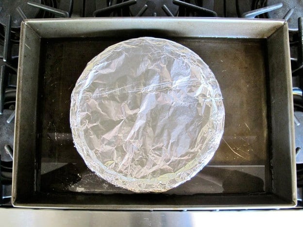 Pie plate covered tightly with foil.