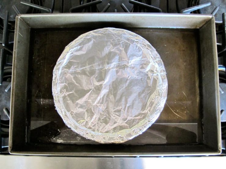 Pie plate covered tightly with foil.