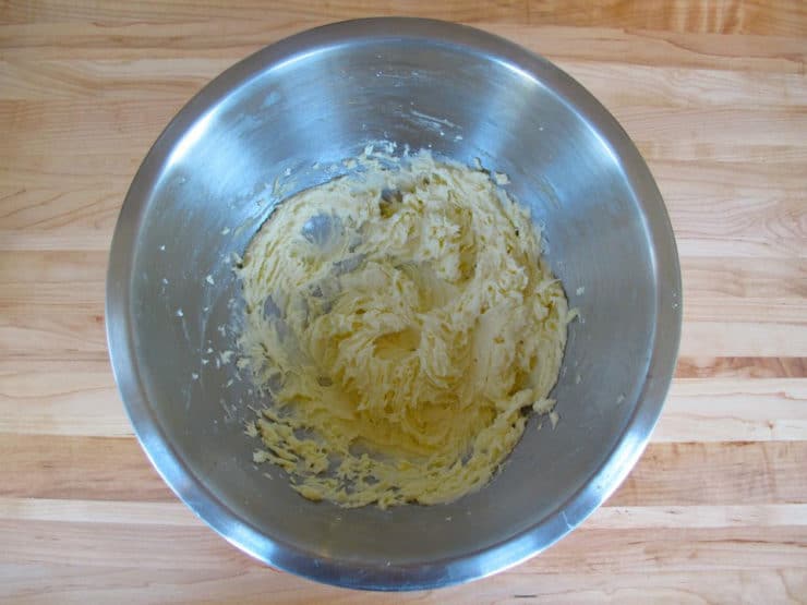 Egg beaten into butter and sugar.