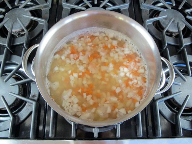 Diced vegetables added to Dutch oven.