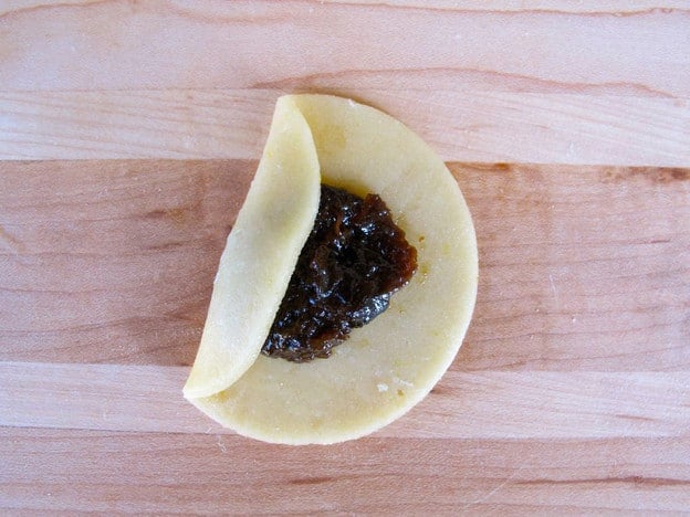 One end of circle folded over filling.
