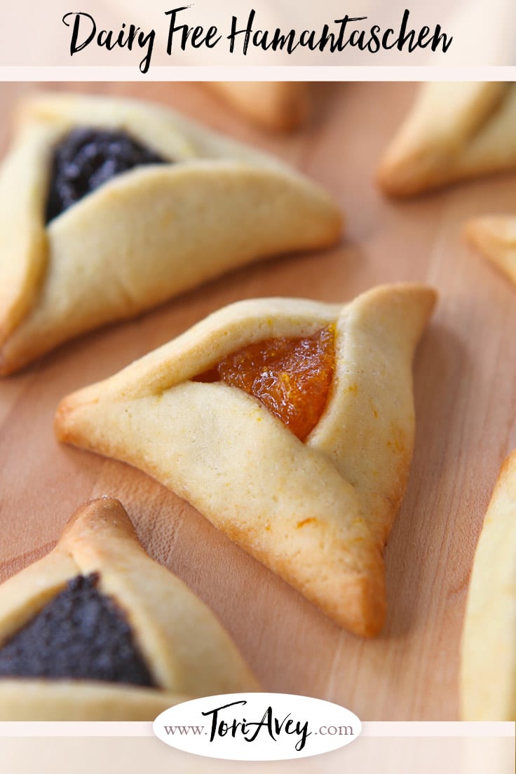 Dairy Free Hamantaschen - Learn to make pareve hamantaschen dough, easy to work with for any filling. Delicate, thin, orange-scented cookies. | ToriAvey.com #cookies #dairyfree #kosher #parve #hamantaschen #holidaycookies #purim #cookiefilling #hamanshats #howto #kitchentips #purimcookies #cookieartistry #nomnom #dessert #baking #bakingproject #bakethis #todayIlearned #holidayproject #jewishholidays