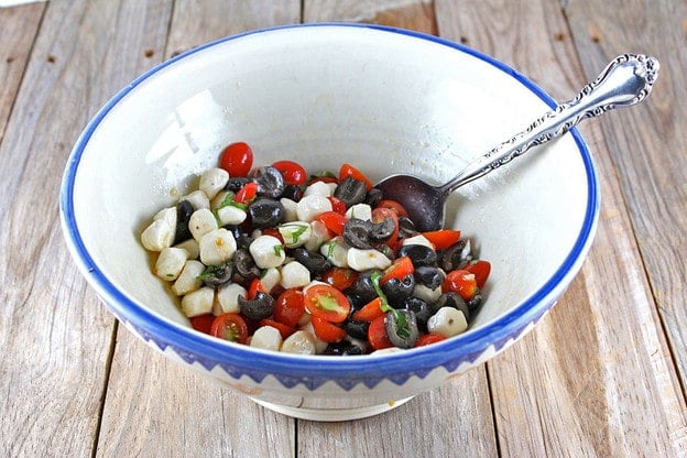 Dressing tossed with Caprese salad.