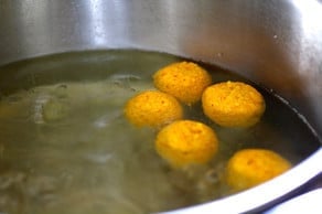 Matzo balls in boiling water.