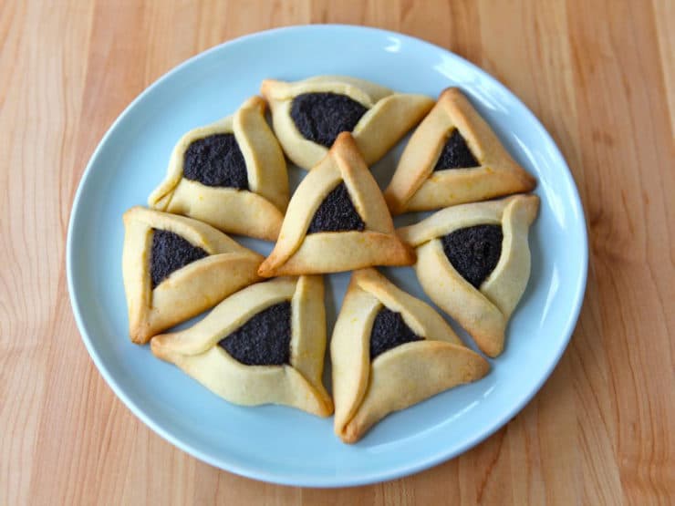 How to Make Perfect Hamantaschen - Learn to make perfectly shaped hamantaschen that won\'t open, spread, or leak in the oven. Tips, recipes, folding techniques, troubleshooting.