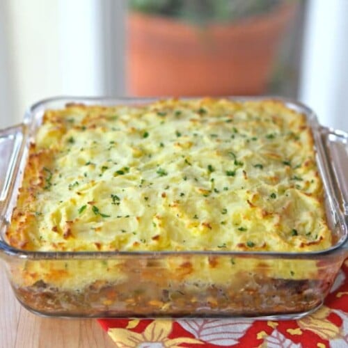 A delicious Shepherd's Pie with layers of seasoned ground meat, vegetables, and creamy mashed potatoes