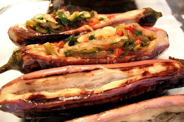 Roasted eggplant split open.