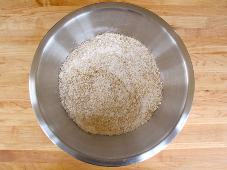 Oats and flour in a mixing bowl.