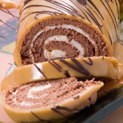 Learn to make a kosher Cheese Roulade with Caramel Chocolate Glaze from Leah Schapira. Kosher for Passover, gluten free, Pesach, Dessert, Dairy, Vegetarian, Baking.