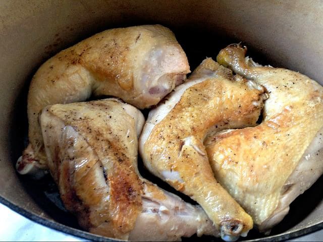 Browned chicken quarters.