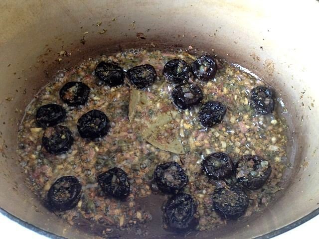 Prunes added to Dutch oven.