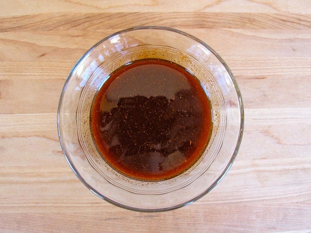 Olive oil and paprika in a small bowl.