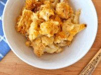 Roasted Cauliflower Gratin Pinterest Pin - Overhead shot of a delicious dish made with roasted cauliflower, creamy cheese sauce, and a crispy breadcrumb topping