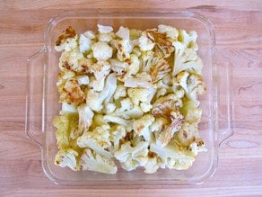 Roasted cauliflower in a gratin dish.