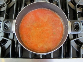 Diced carrots stirred into tomato juice.
