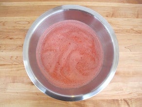 Strained tomato juice in a bowl.