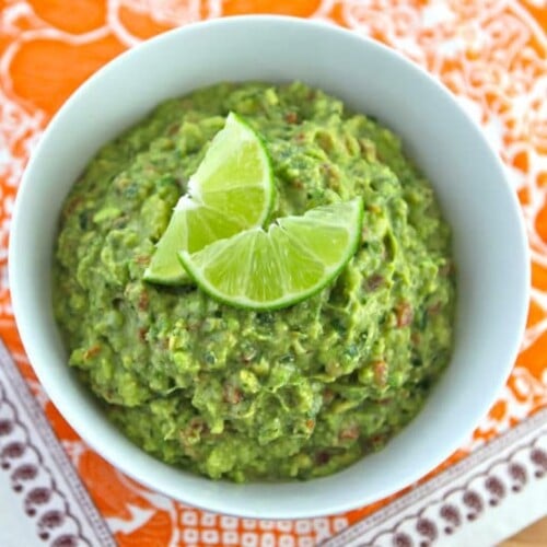 Smoky Guacamole - Make traditional Mexican guacamole from scratch with ripe avocado, fresh lime juice, and smoked paprika for a subtle smoky flavor. Kosher, Vegan