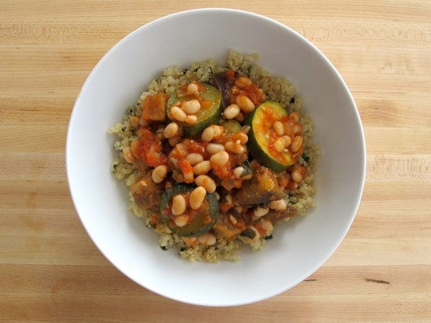 Vegetables on top of quinoa in a serving bowl.