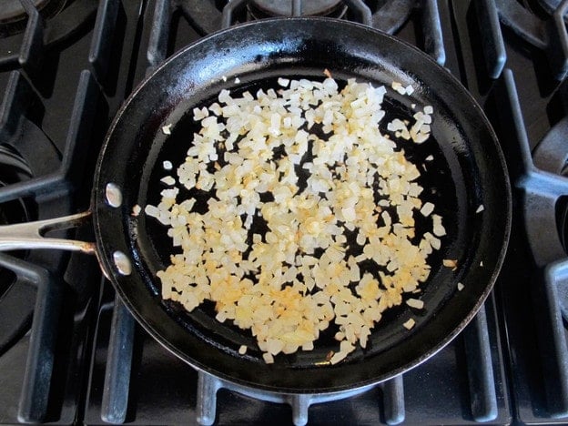 Diced onion in a skillet.
