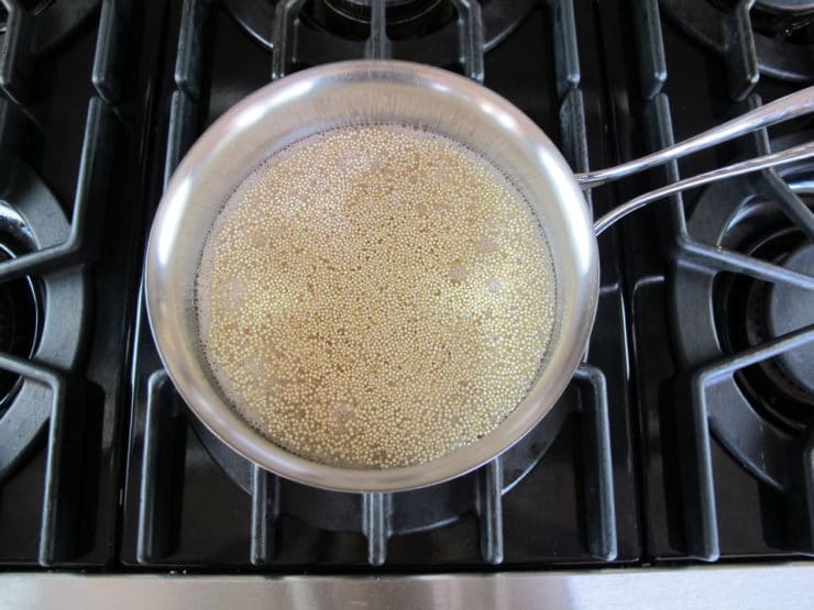 Cooking quinoa on the stove.