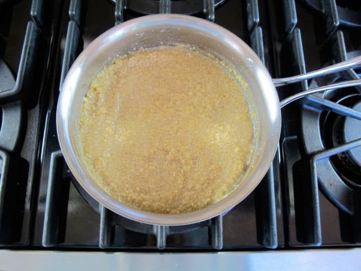Cooked quinoa in a saucepan.