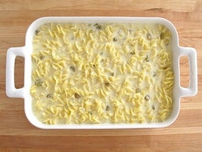 Kugel poured into a baking dish.