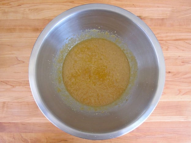 Adding yogurt and eggs to butter.
